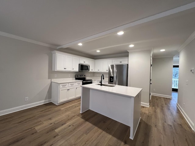 232 Twin Cove Dr, Lebanon, TN 37087 - kitchen with stainless steel appliances, crown molding, dark wood-style flooring, light countertops, and white cabinetry