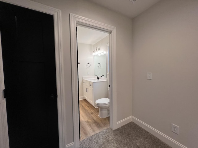 232 Twin Cove Dr, Lebanon, TN 37087 - half bathroom with vanity and wood finished floors