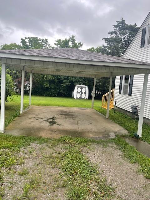 764 Center St, Lewisburg, TN 37091 - view of car parking featuring a storage unit