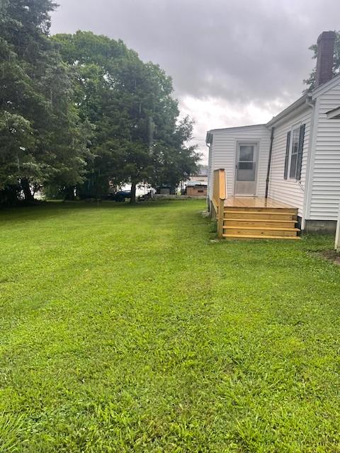 764 Center St, Lewisburg, TN 37091 - view of green lawn with a deck
