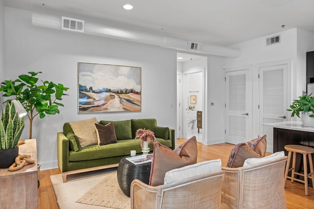 201 S 11th St, Nashville, TN 37206 - living area featuring light wood finished floors and recessed lighting
