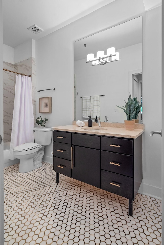 201 S 11th St, Nashville, TN 37206 - full bathroom with vanity, shower / bath combination with curtain, tile patterned floors, and a chandelier