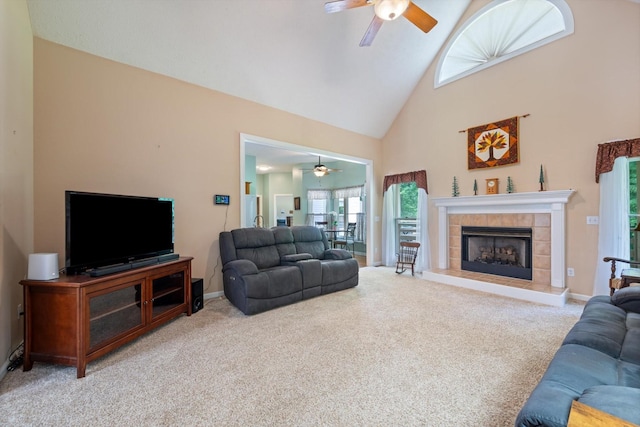 191 Spicer Rd, Burns, TN 37029 - living room with ceiling fan, high vaulted ceiling, carpet floors, and a tile fireplace
