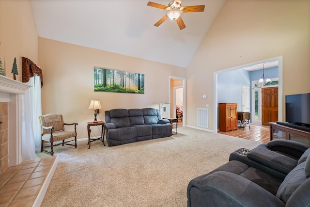 191 Spicer Rd, Burns, TN 37029 - living area with high vaulted ceiling, carpet flooring, and a ceiling fan