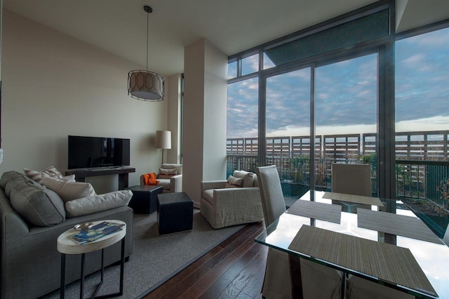 1212 Laurel St Unit 2009, Nashville, TN 37203 - living area with floor to ceiling windows, plenty of natural light, and dark wood-style floors