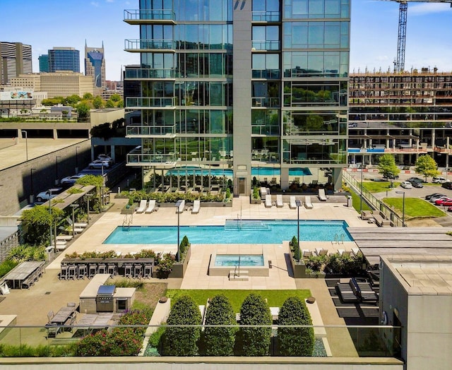 1212 Laurel St Unit 2009, Nashville, TN 37203 - community pool featuring a view of city and a patio