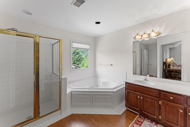 4016 Brandywine Pointe Blvd, Old Hickory, TN 37138 - full bath with a bath, a shower stall, vanity, and wood finished floors