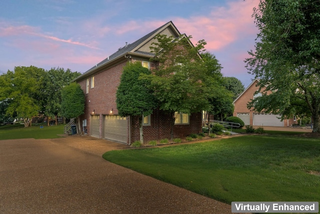 4016 Brandywine Pointe Blvd, Old Hickory, TN 37138 - view of side of home with brick siding, a yard, an attached garage, and driveway