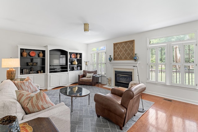 4016 Brandywine Pointe Blvd, Old Hickory, TN 37138 - living area featuring a fireplace with flush hearth and hardwood / wood-style flooring