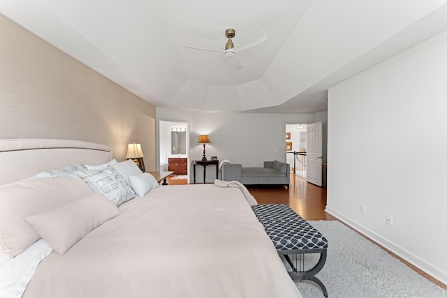 4016 Brandywine Pointe Blvd, Old Hickory, TN 37138 - bedroom with a tray ceiling, wood finished floors, a ceiling fan, and ensuite bathroom