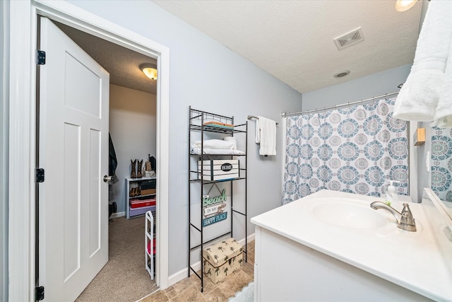 258 Green Meadow Dr, Smithville, TN 37166 - bathroom with vanity, a textured ceiling, and curtained shower