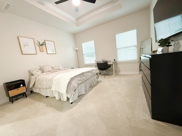 101 Percheron Pl, Smyrna, TN 37167 - bedroom with light carpet, a tray ceiling, a desk, and ceiling fan