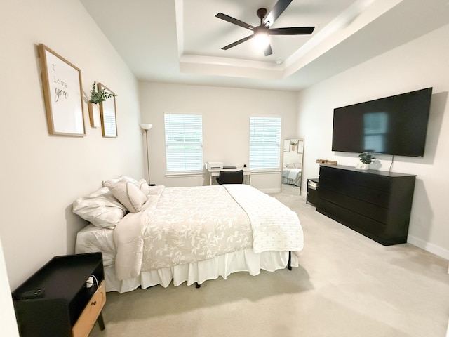 101 Percheron Pl, Smyrna, TN 37167 - bedroom with a tray ceiling, light carpet, and ceiling fan