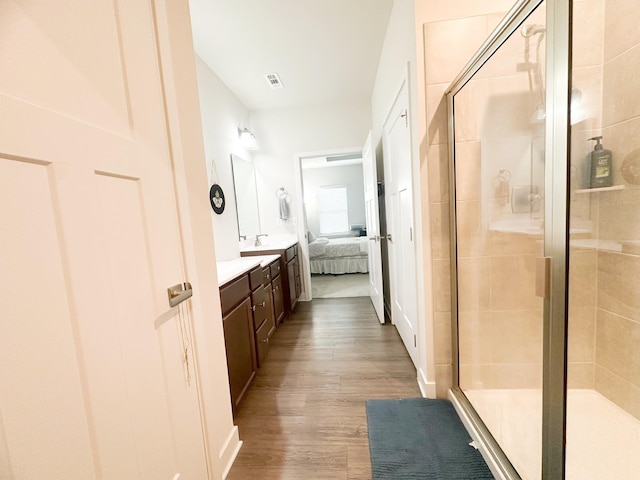 101 Percheron Pl, Smyrna, TN 37167 - bathroom featuring vanity, a shower stall, wood finished floors, and ensuite bathroom