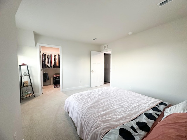 101 Percheron Pl, Smyrna, TN 37167 - bedroom with light colored carpet, a walk in closet, and a closet