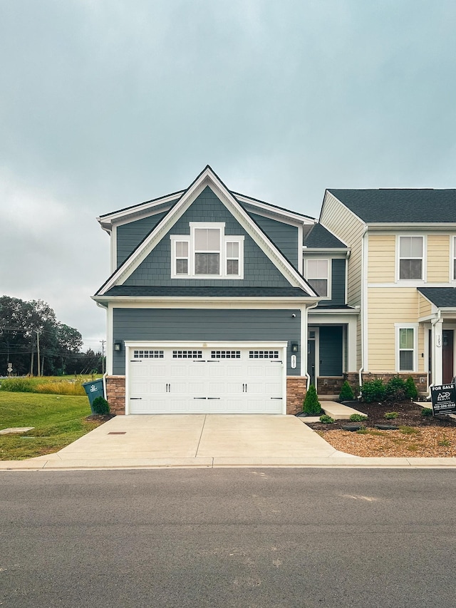 101 Percheron Pl, Smyrna, TN 37167 - craftsman inspired home with driveway, stone siding, and a garage