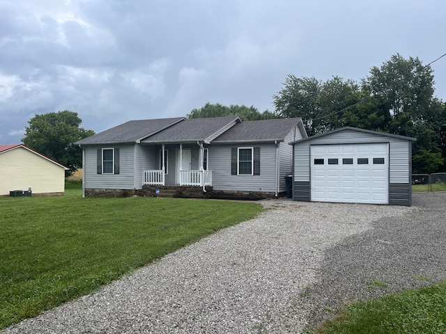 1812 Carneal Ln, Oak Grove, KY 42262 - single story home with covered porch, driveway, an outdoor structure, roof with shingles, and a front lawn