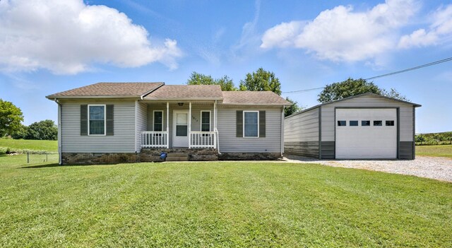 1812 Carneal Ln, Oak Grove, KY 42262 - single story home featuring a porch, crawl space, a garage, an outbuilding, and gravel driveway