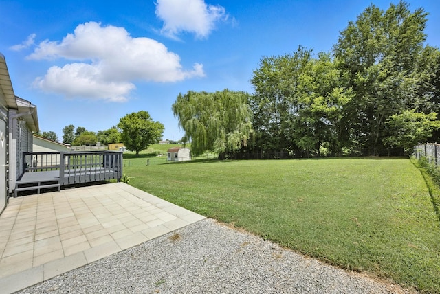 1812 Carneal Ln, Oak Grove, KY 42262 - view of green lawn featuring a patio and a deck