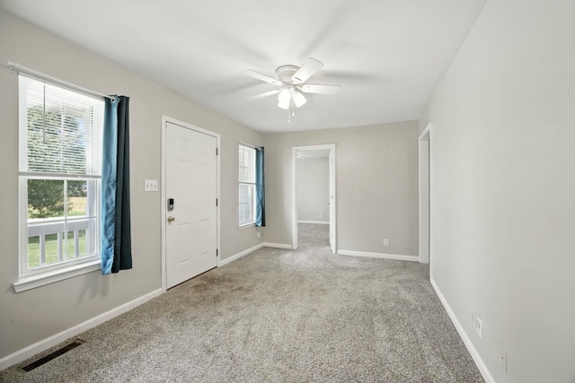 1812 Carneal Ln, Oak Grove, KY 42262 - carpeted foyer featuring a ceiling fan and baseboards