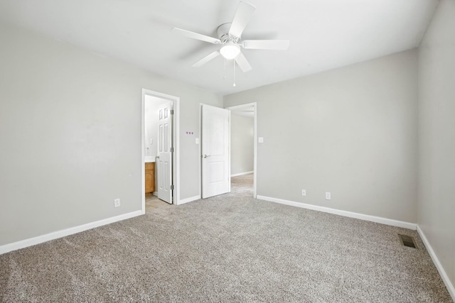 1812 Carneal Ln, Oak Grove, KY 42262 - unfurnished bedroom featuring light colored carpet, connected bathroom, and a ceiling fan