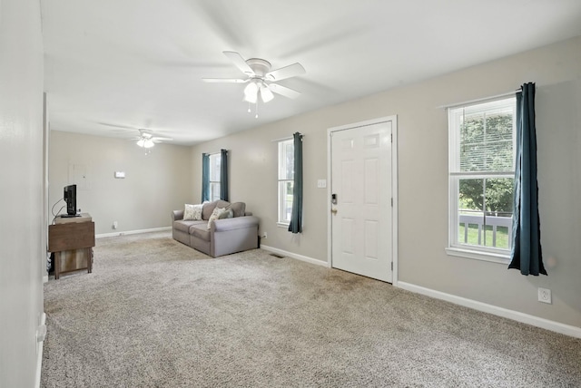 1812 Carneal Ln, Oak Grove, KY 42262 - carpeted living area with ceiling fan and baseboards