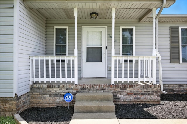 1812 Carneal Ln, Oak Grove, KY 42262 - view of exterior entry featuring a porch