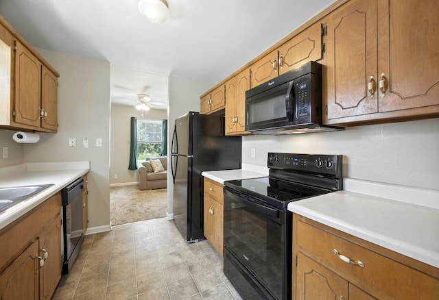 1812 Carneal Ln, Oak Grove, KY 42262 - kitchen featuring black appliances, light countertops, ceiling fan, and brown cabinetry