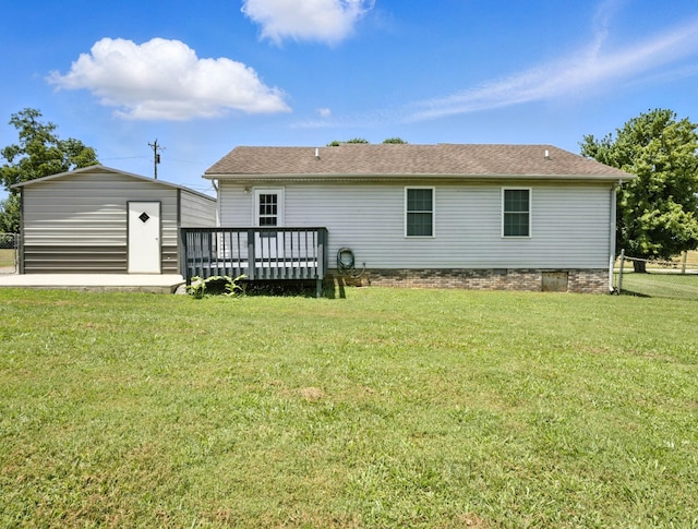 1812 Carneal Ln, Oak Grove, KY 42262 - back of house with a wooden deck, a shed, and roof with shingles