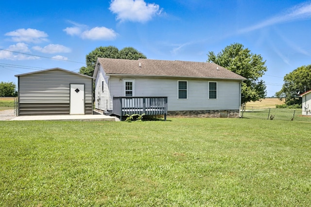 1812 Carneal Ln, Oak Grove, KY 42262 - rear view of property featuring a wooden deck, a storage shed, and a shingled roof