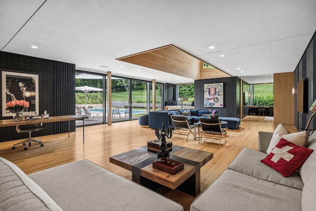 1091 Lynnwood Blvd, Nashville, TN 37215 - living room with wood finished floors, plenty of natural light, wooden walls, an office area, and a wall of windows