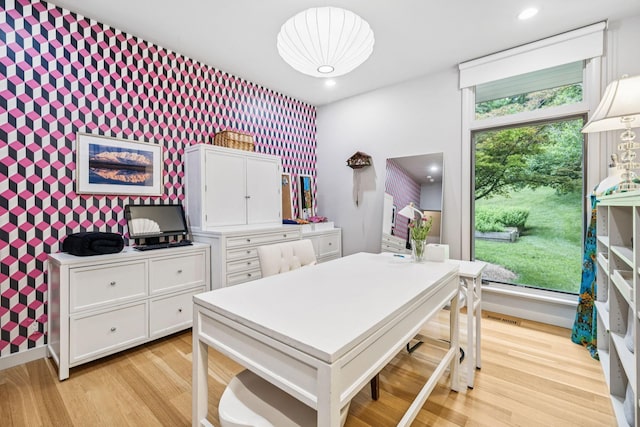 1091 Lynnwood Blvd, Nashville, TN 37215 - bedroom with wallpapered walls, an accent wall, light wood finished floors, recessed lighting, and a desk