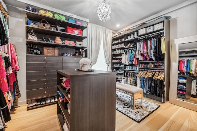 1091 Lynnwood Blvd, Nashville, TN 37215 - walk in closet featuring a chandelier and wood finished floors