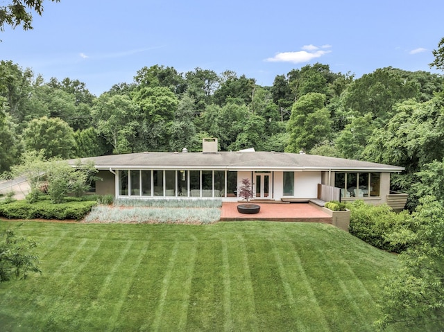 1091 Lynnwood Blvd, Nashville, TN 37215 - rear view of house with french doors, a yard, a patio, and a wooded view