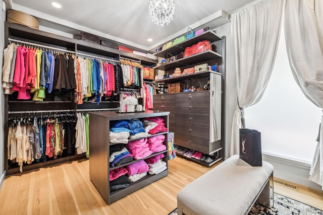 1091 Lynnwood Blvd, Nashville, TN 37215 - spacious closet with wood finished floors and a chandelier