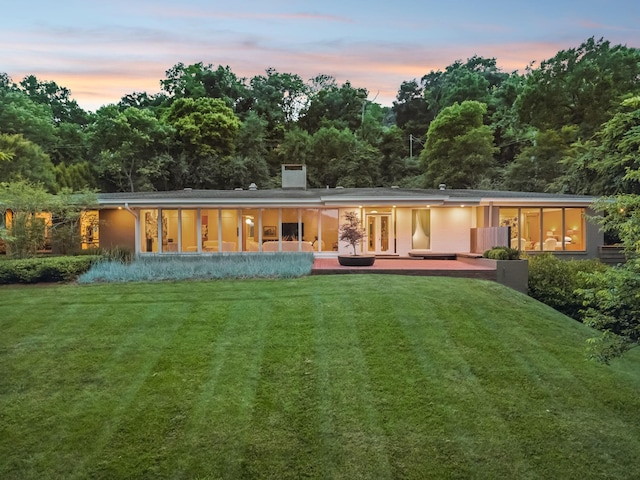1091 Lynnwood Blvd, Nashville, TN 37215 - rear view of property featuring a yard and a chimney