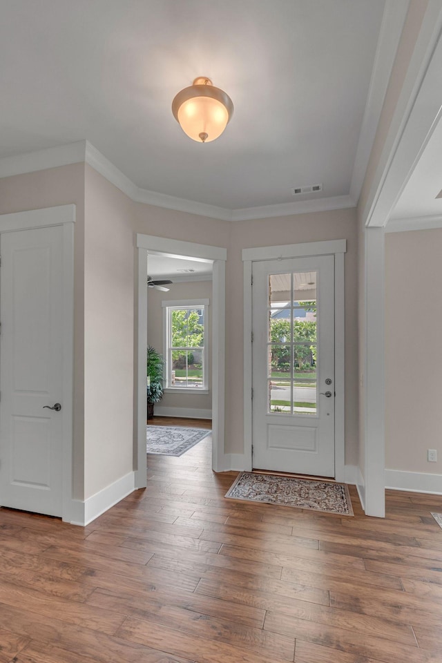 1074 Amelia Park Dr, Franklin, TN 37067 - entrance foyer featuring wood-type flooring and crown molding
