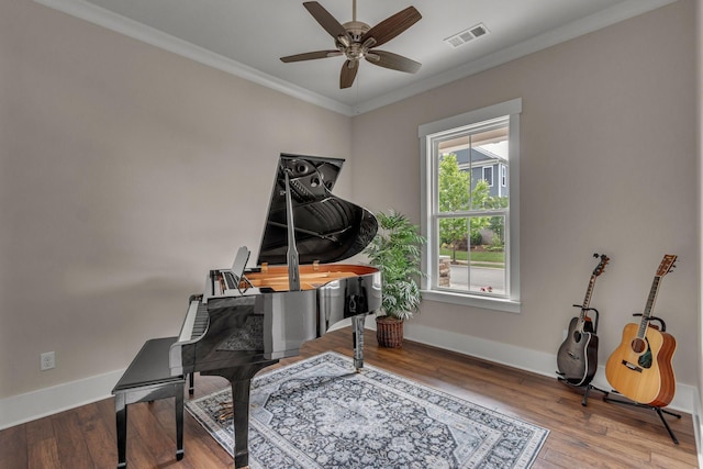 1074 Amelia Park Dr, Franklin, TN 37067 - sitting room with a ceiling fan, crown molding, wood finished floors, and a desk