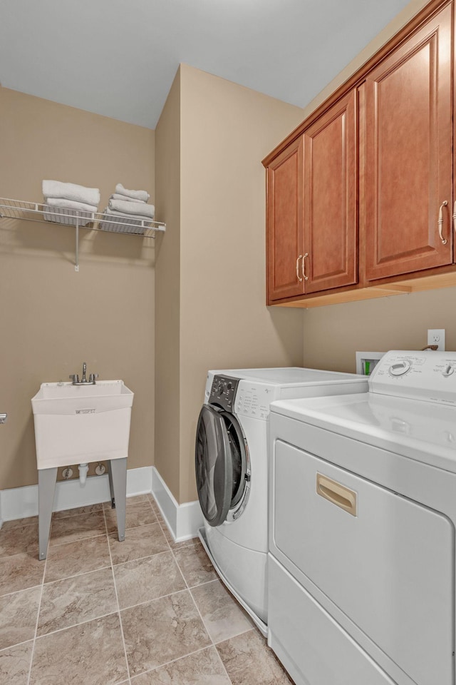 1074 Amelia Park Dr, Franklin, TN 37067 - laundry room with washing machine and clothes dryer and cabinet space