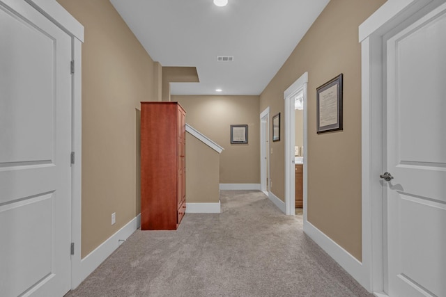 1074 Amelia Park Dr, Franklin, TN 37067 - hall with light colored carpet, recessed lighting, and stairway