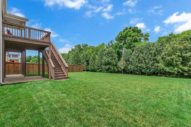 1074 Amelia Park Dr, Franklin, TN 37067 - view of green lawn featuring stairway, a patio area, and a wooden deck