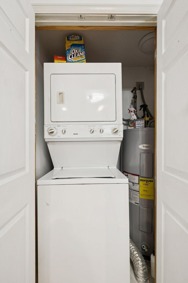 617 Still Point Rd, Smithville, TN 37166 - laundry room with stacked washer / dryer and electric water heater