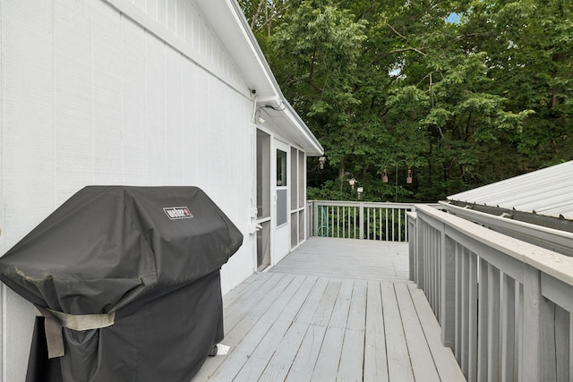 617 Still Point Rd, Smithville, TN 37166 - wooden terrace featuring area for grilling and view of wooded area
