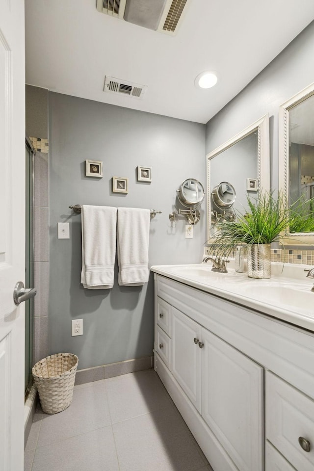 617 Still Point Rd, Smithville, TN 37166 - full bathroom featuring double vanity, a shower stall, and tile patterned floors