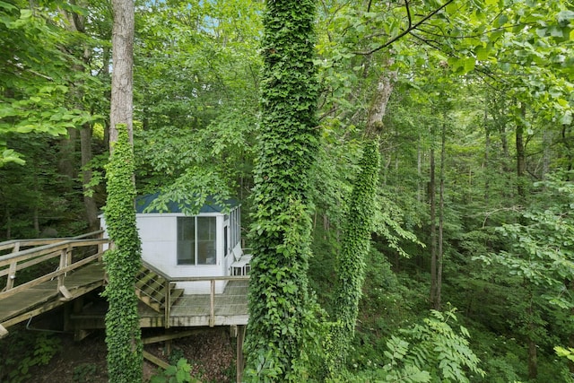 617 Still Point Rd, Smithville, TN 37166 - view of side of property featuring a wooden deck and a wooded view