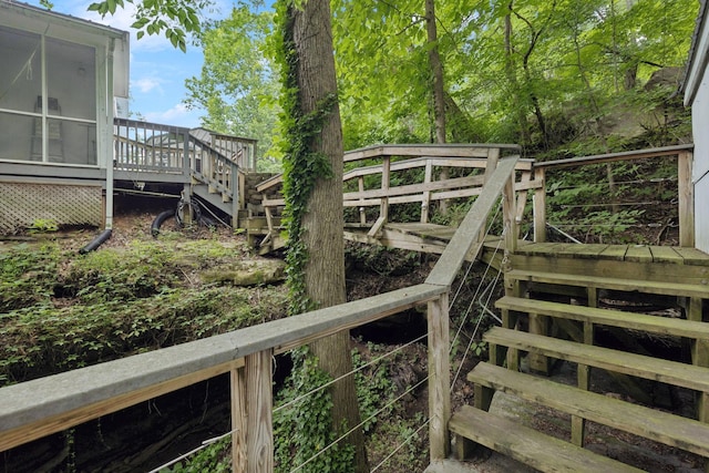617 Still Point Rd, Smithville, TN 37166 - deck featuring stairway and a sunroom