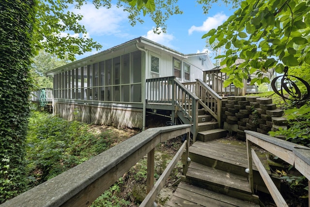 617 Still Point Rd, Smithville, TN 37166 - wooden terrace with a sunroom and stairway