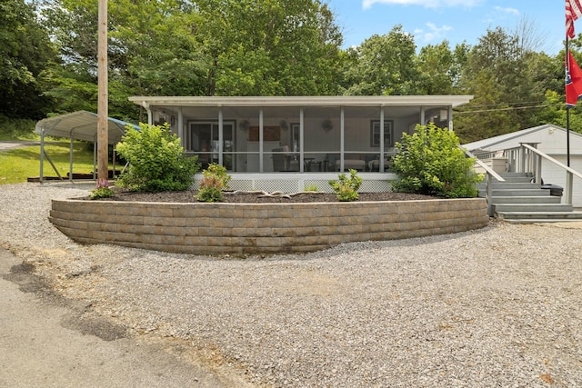 617 Still Point Rd, Smithville, TN 37166 - rear view of house with a sunroom and driveway