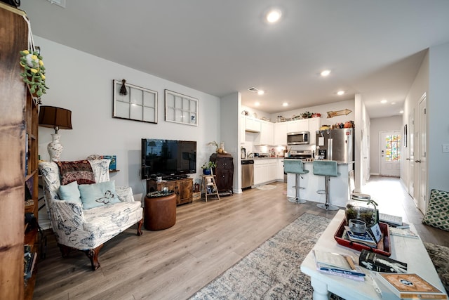 701 Dallas Dr, Columbia, TN 38401 - living area with light wood-type flooring and recessed lighting