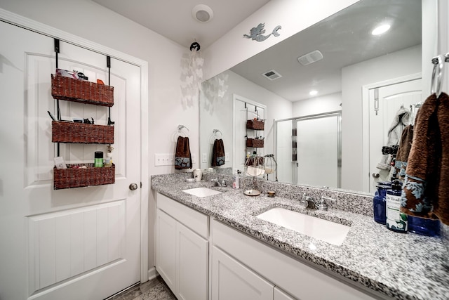 701 Dallas Dr, Columbia, TN 38401 - full bathroom with double vanity and a stall shower